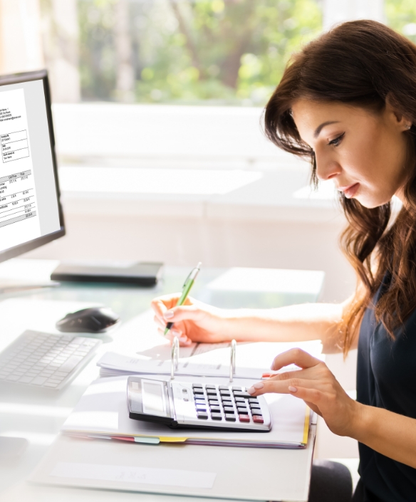 Women professional working on financial data.